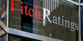 Fitch понизило рейтинг